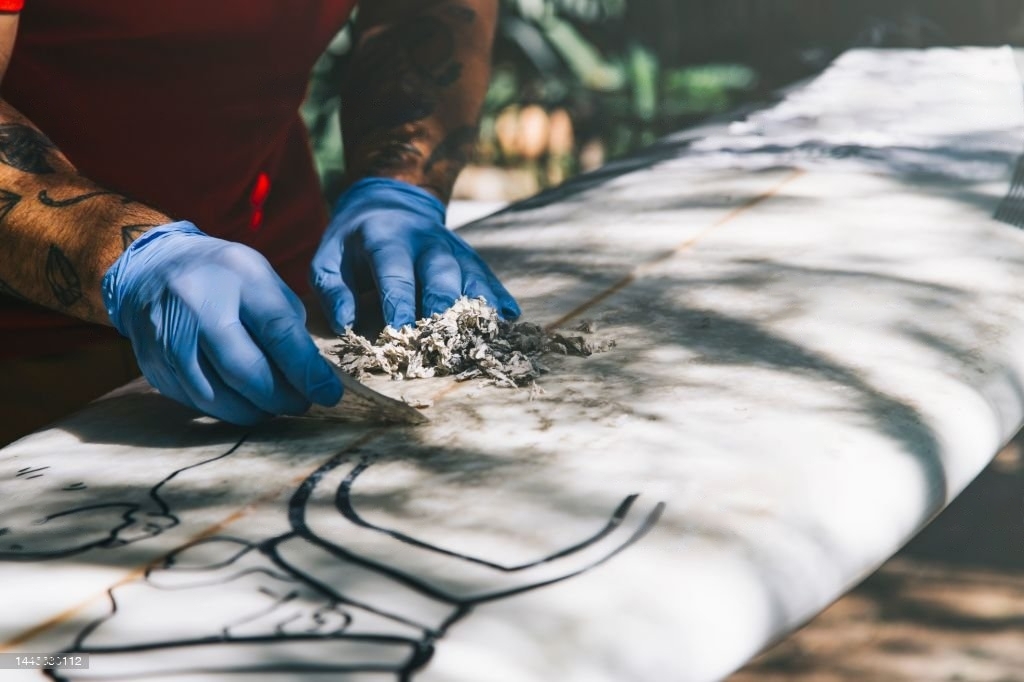 Waxen van een surfboard